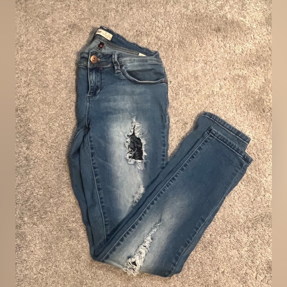 Women's Blue Distressed Jeans accented with black lace